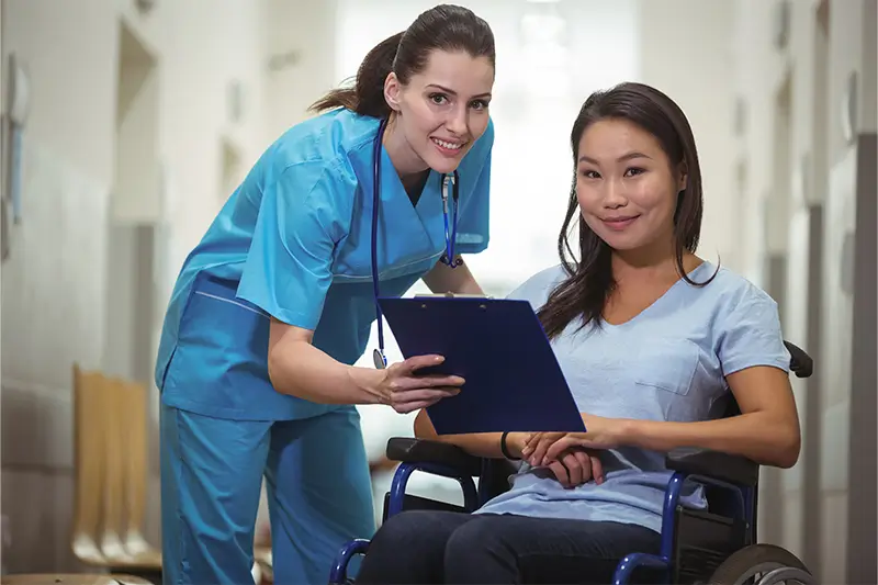 Registered community nurse visiting a client at home on the Gold Coast